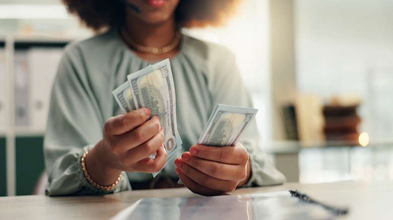 Women counting cash