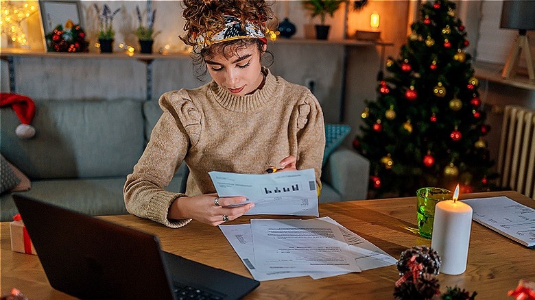 Woman budgeting during holidays