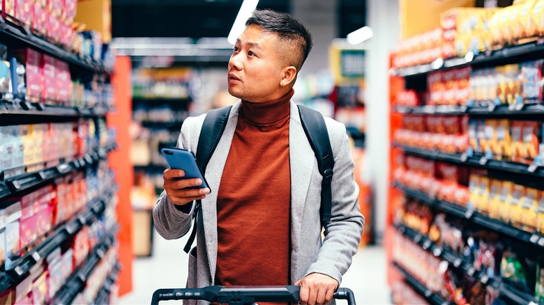 Person shopping at grocery store