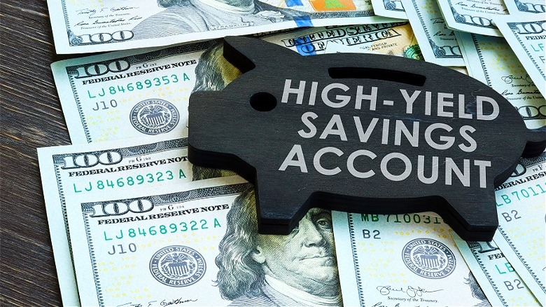 Piggy bank cutout with $100s