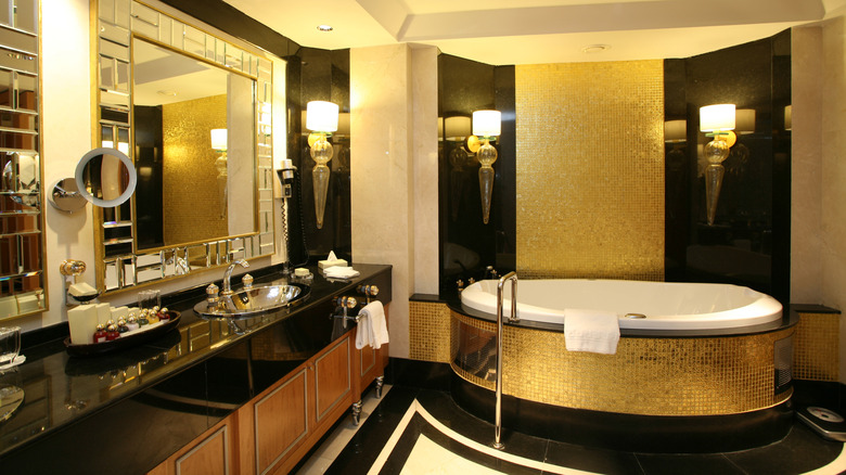 Gold master modern & luxury bathroom interior with hot tub