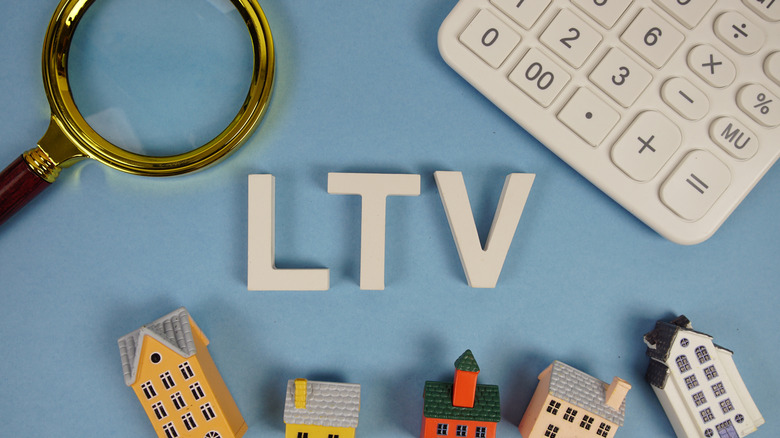The letters LTV in wood blocks on a desk