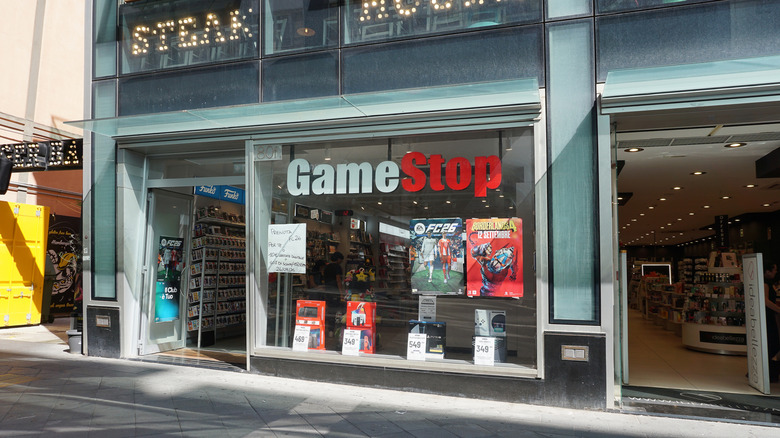 A GameStop storefront with its doors open