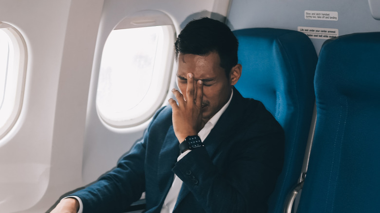 Unhappy plane traveler