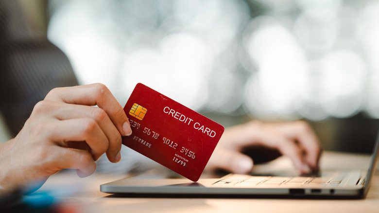 Credit card being used on computer