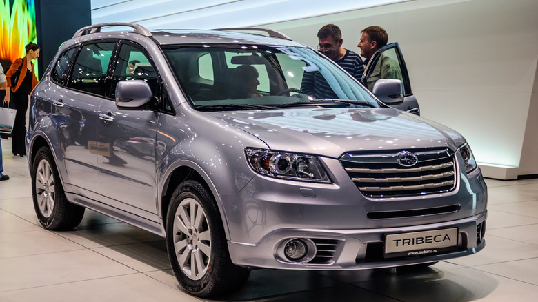 metallic light blue subaru tribeca on display